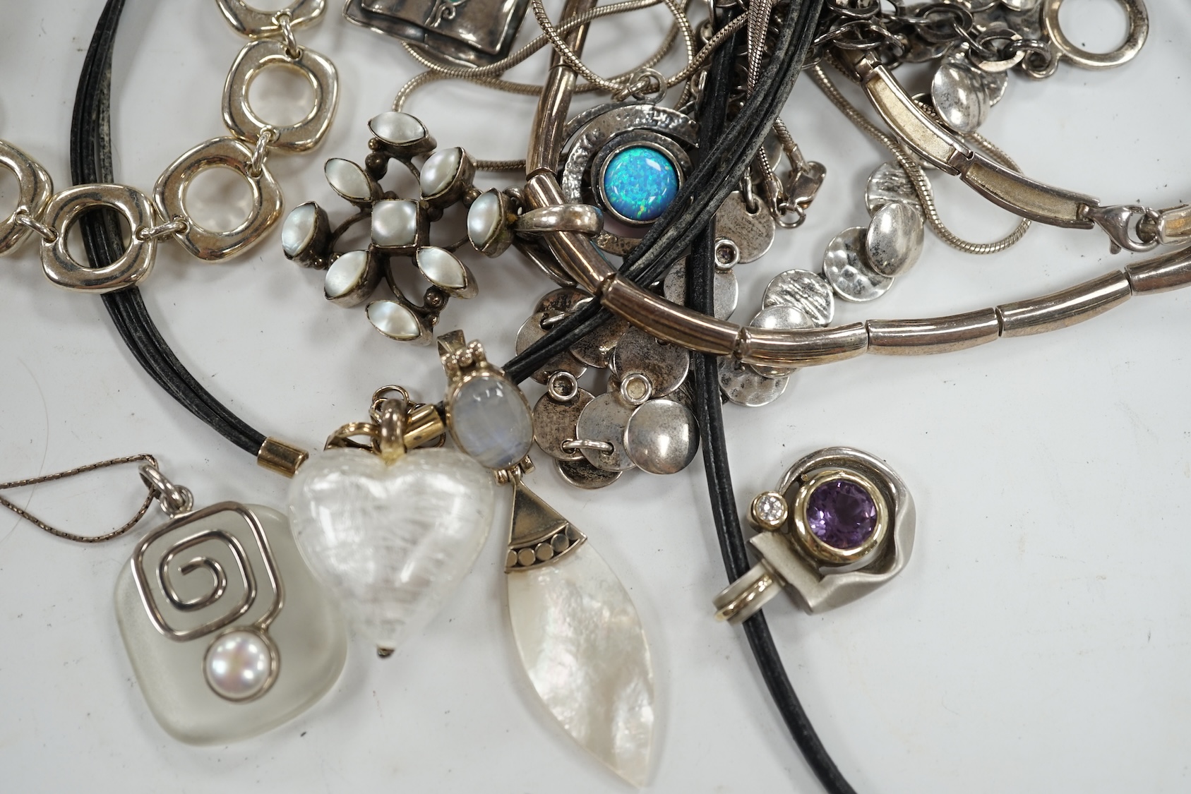 A small group of assorted modern 925 and white metal jewellery including necklaces, bracelet etc. Condition - fair